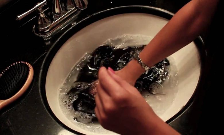 Washing human hair wigs.